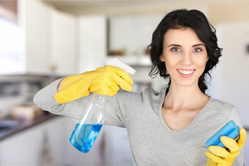 Cleaner inspecting carpet condition before treatment